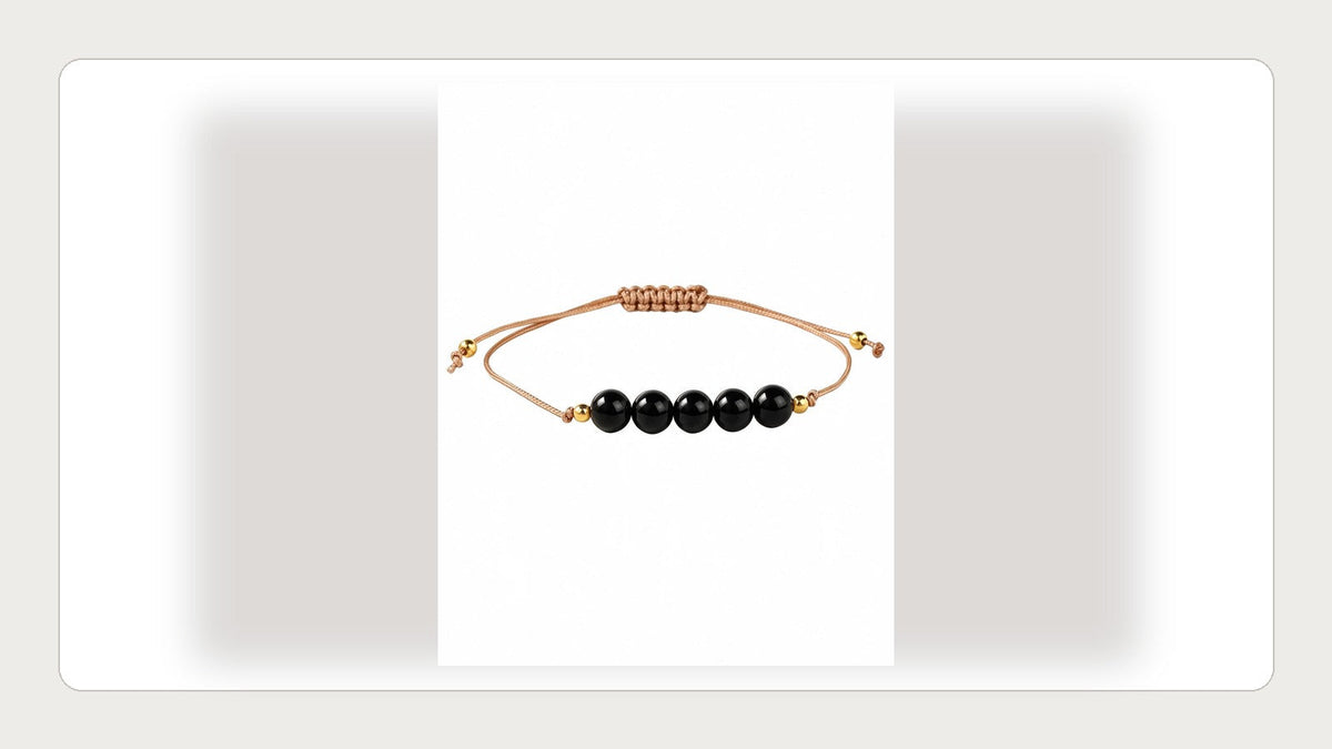 Black onyx bracelet styled with simple everyday pieces