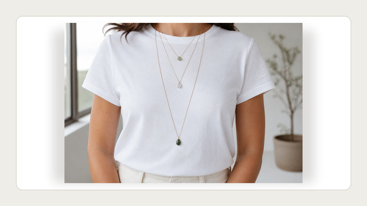 Natural stone pendants and beads compared on a quiet neutral surface