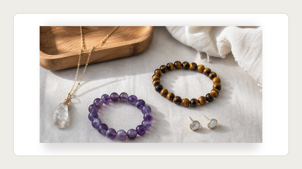 Everyday natural stone jewelry selected beside a simple wardrobe palette